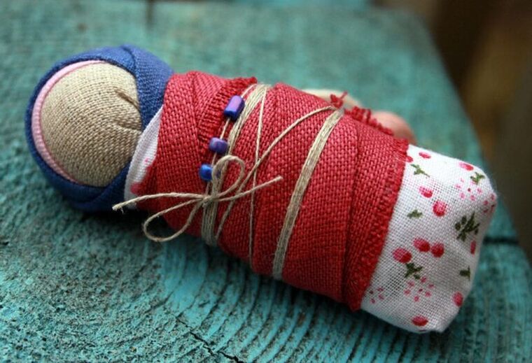 Diaper doll as a talisman of health