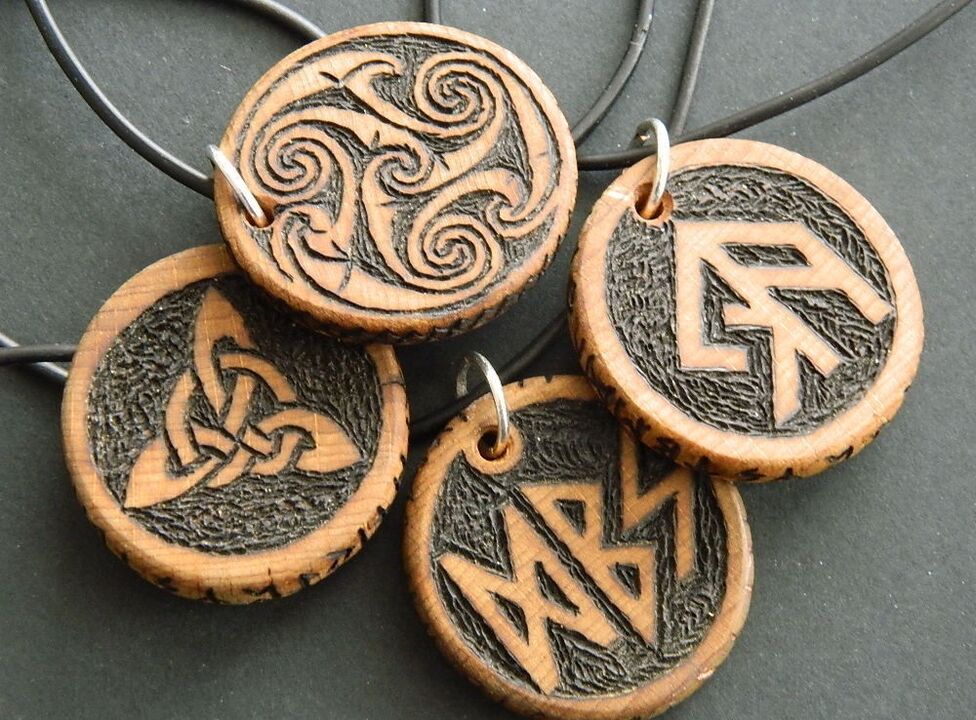 Pendant with runes for good luck